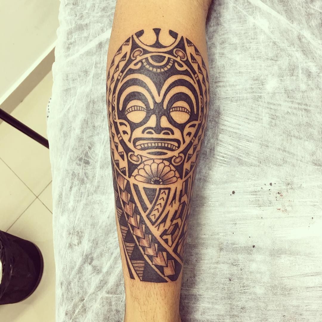 Tiki Medallion with Triangle Motif Tiki Tattoo Tattoo on skin