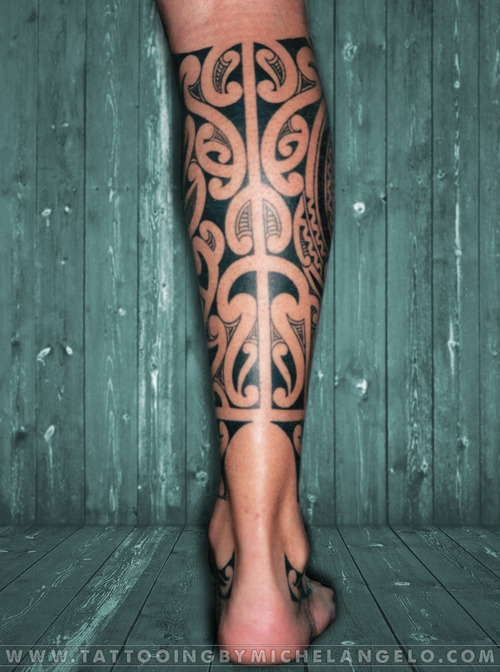 Tribal Design Below the Knee Tiki Tattoos Tattoo on skin
