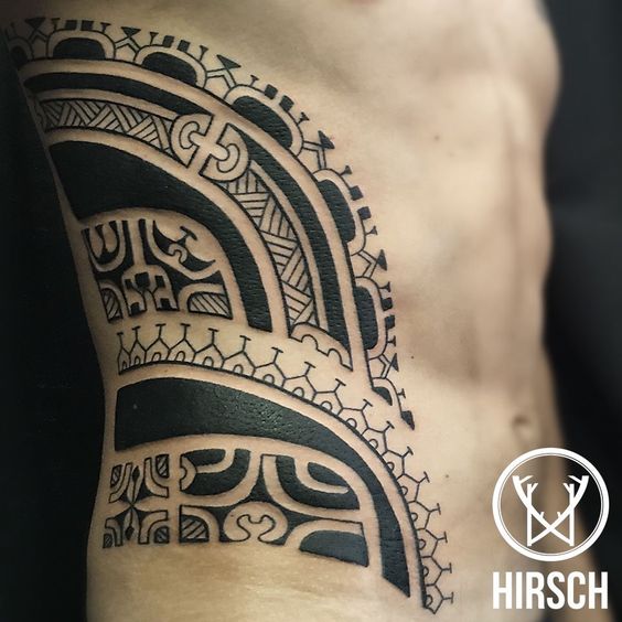 Tribal Design on the Torso Tiki Tattoos Tattoo on skin