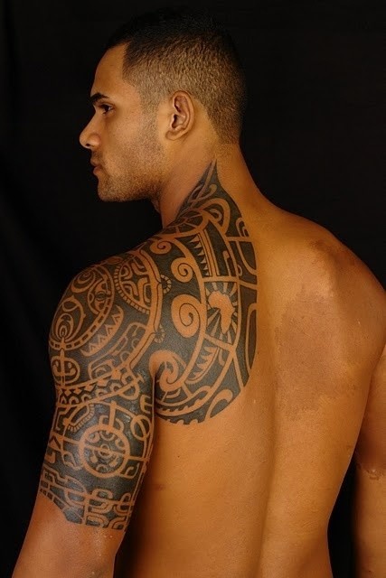 Striking Upper Arm and Shoulder Tribal Tattoo Tattoo on skin
