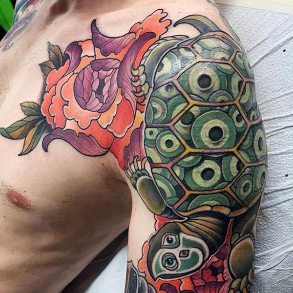 Tortoise with Multiple Eyes and a Flower Turtle Tattoos Tattoo on skin