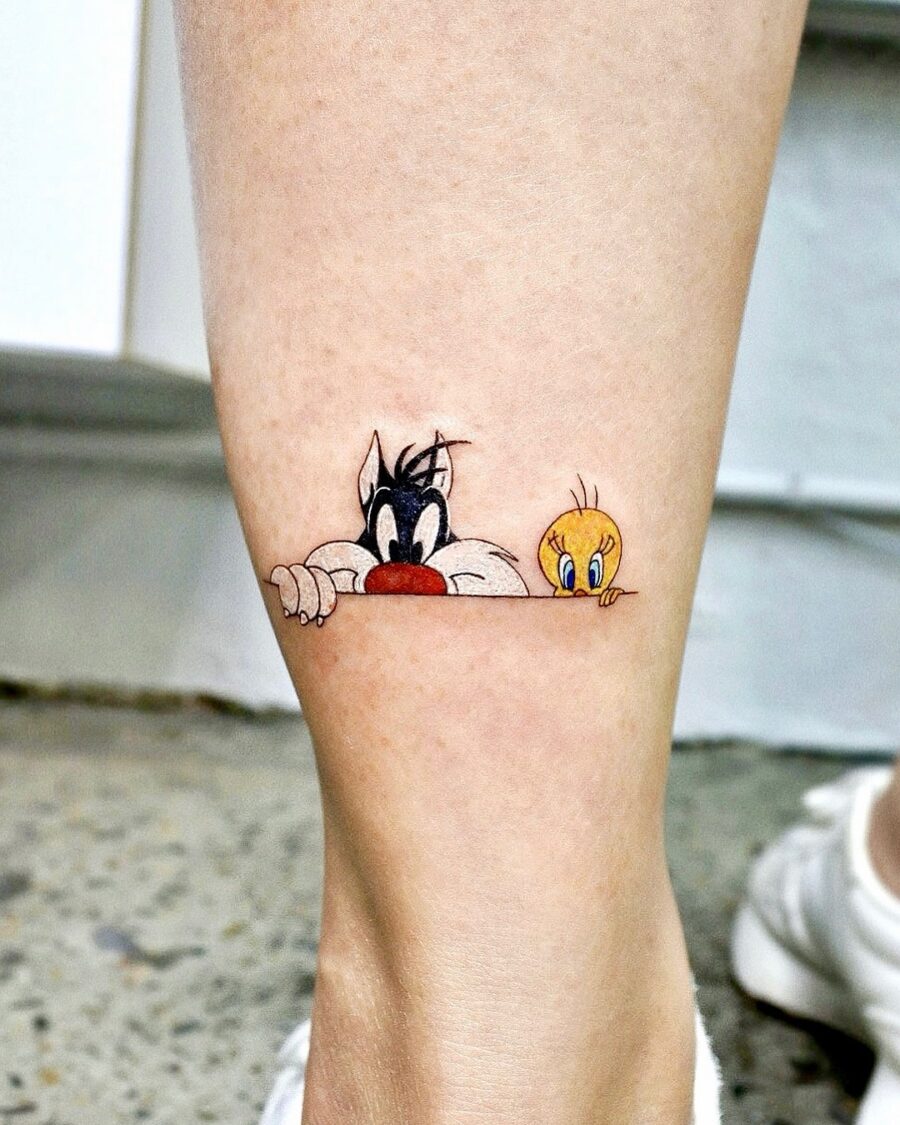 Adorable Tweety and Sylvester Tattoo Design Tattoo on skin