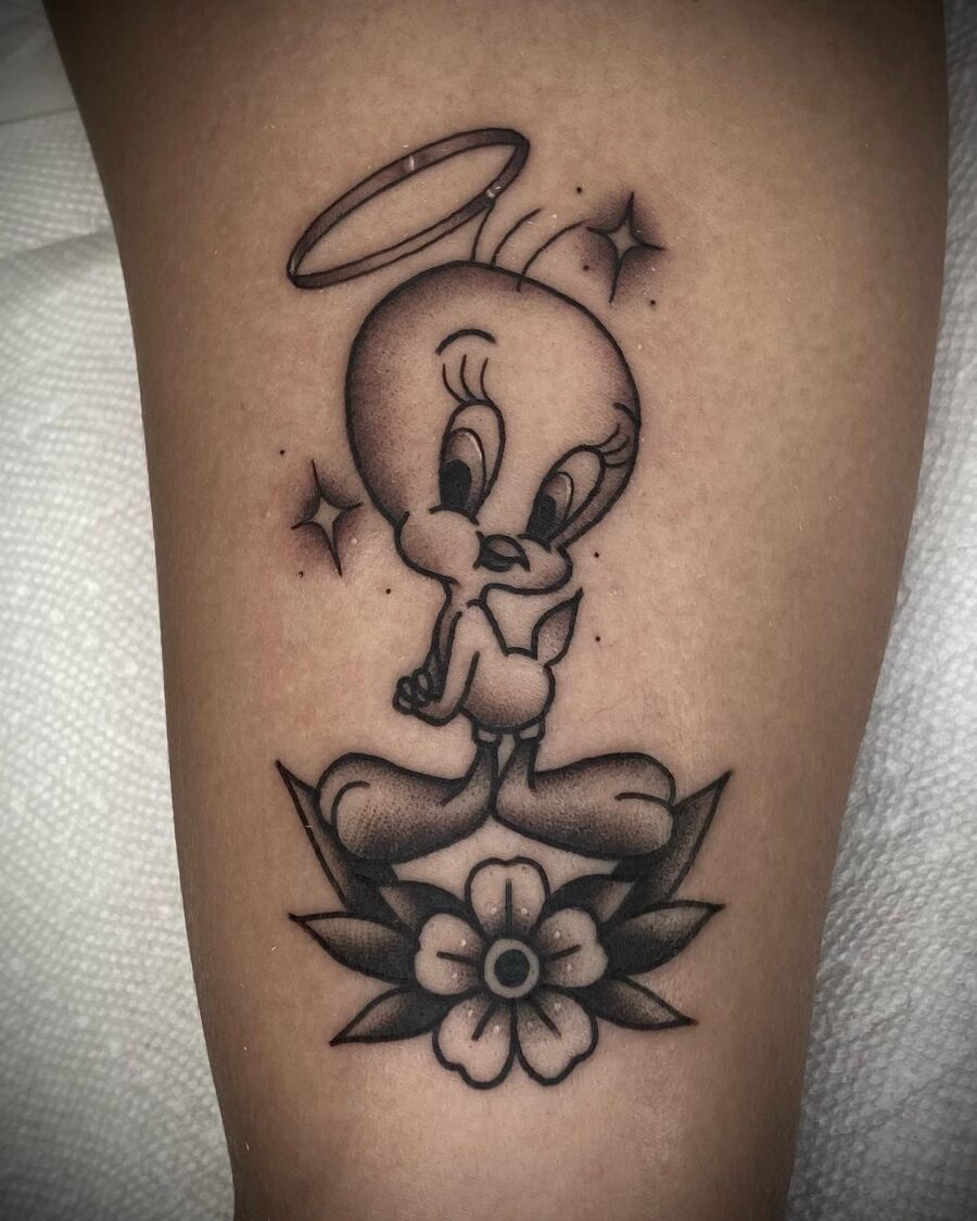 Charming Tweety Tattoo with Floral Elements Tattoo on skin