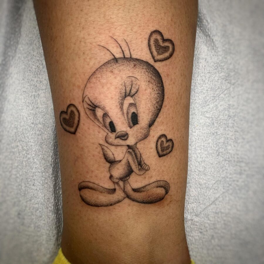 Charming Tweety with Heart Motifs Tattoo on skin
