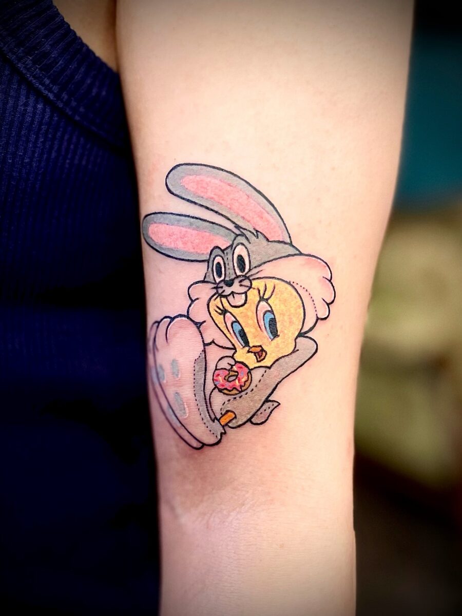 Playful Tweety Bird Bunny Tattoo Design Tattoo on skin