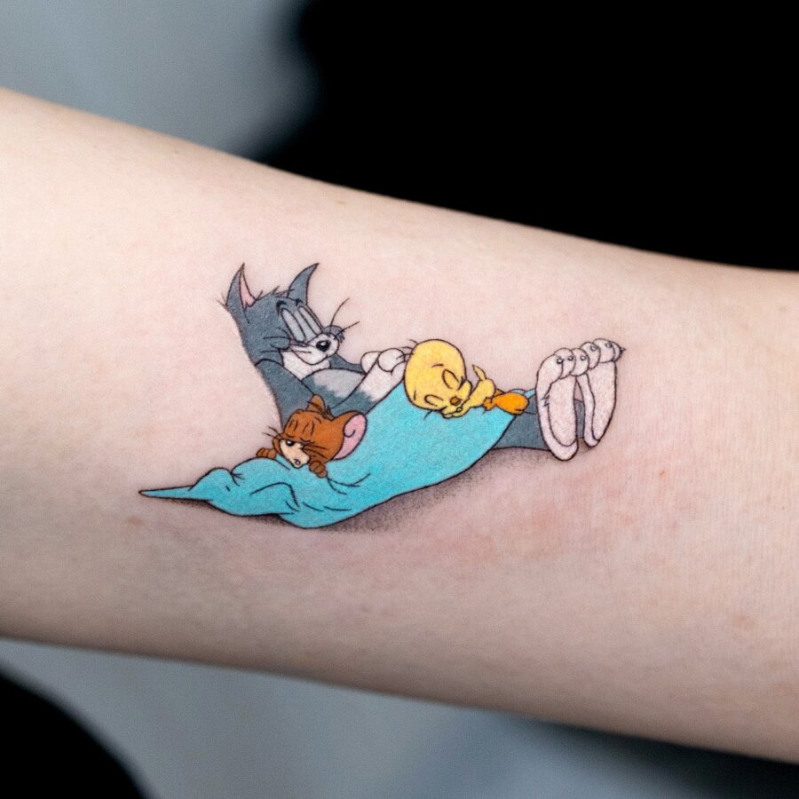 Playful Tweety Designs with Iconic Characters Tattoo on skin