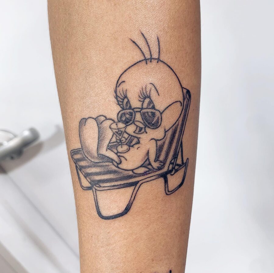 Tweety enjoying a sunny day with style Tattoo on skin