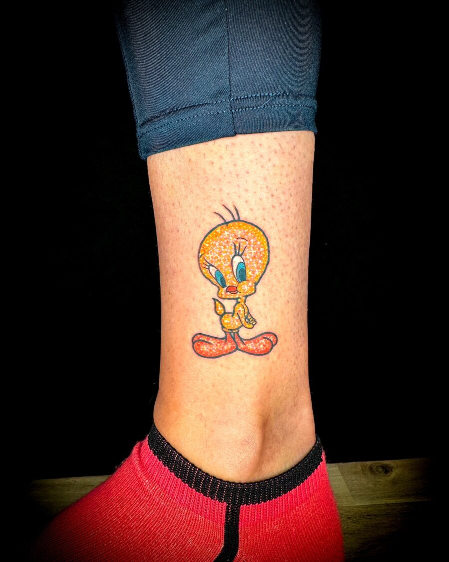 Vibrant Tweety Bird Tattoo on Ankle Tattoo on skin
