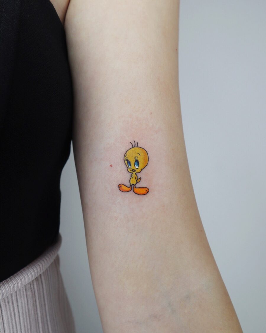 Vibrant Tweety Tattoo on the Arm Tattoo on skin