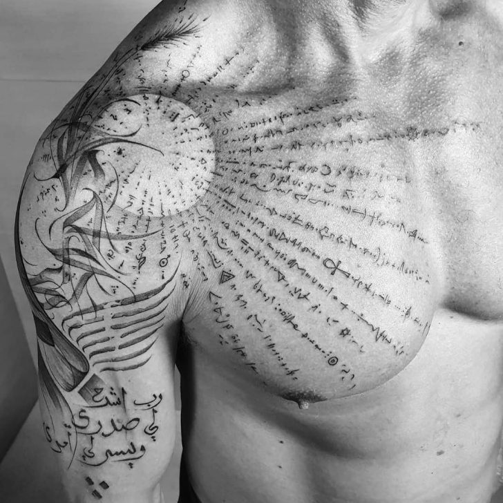 The Ancient Esoteric Script and Radiant Sun Chest Tattoo on skin