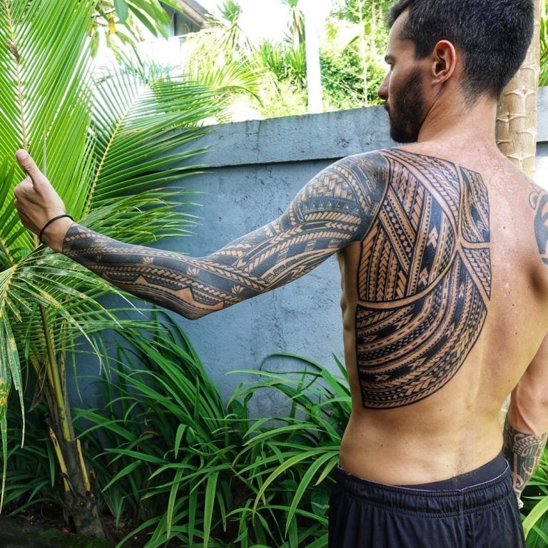 The Samoan Tatau Geometric Full Back and Arm Tattoo on skin