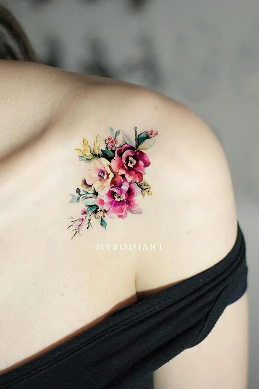 The Watercolor Peony and Wildflower Clavicle Tattoo on skin
