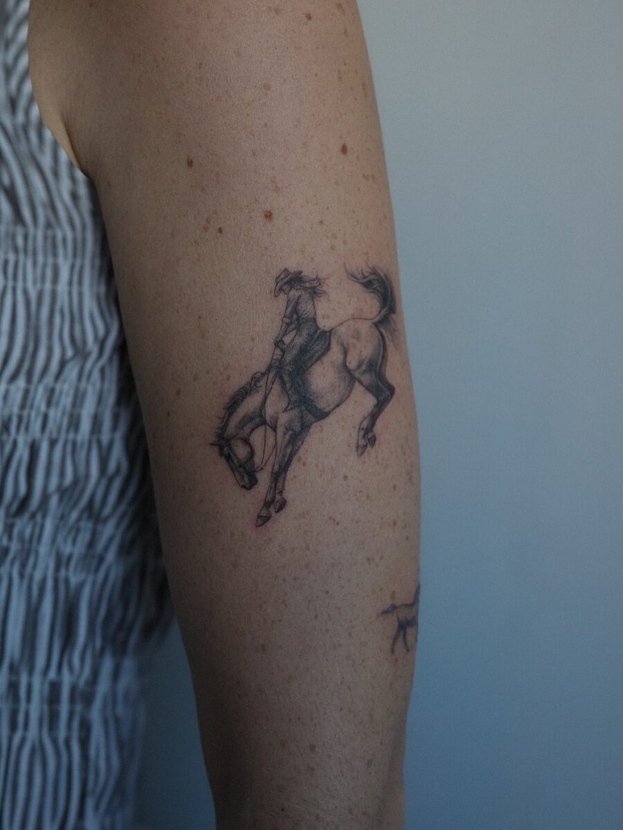 A captivating cowboy tattoo on display Tattoo on skin