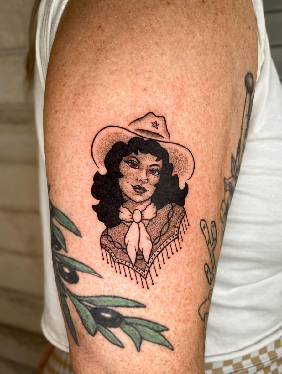 Classic Cowgirl Tattoo with Bold Lines Tattoo on skin