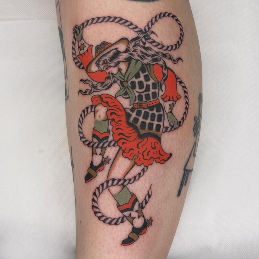 Dynamic Cowgirl With Stylish Rope Tattoo Tattoo on skin