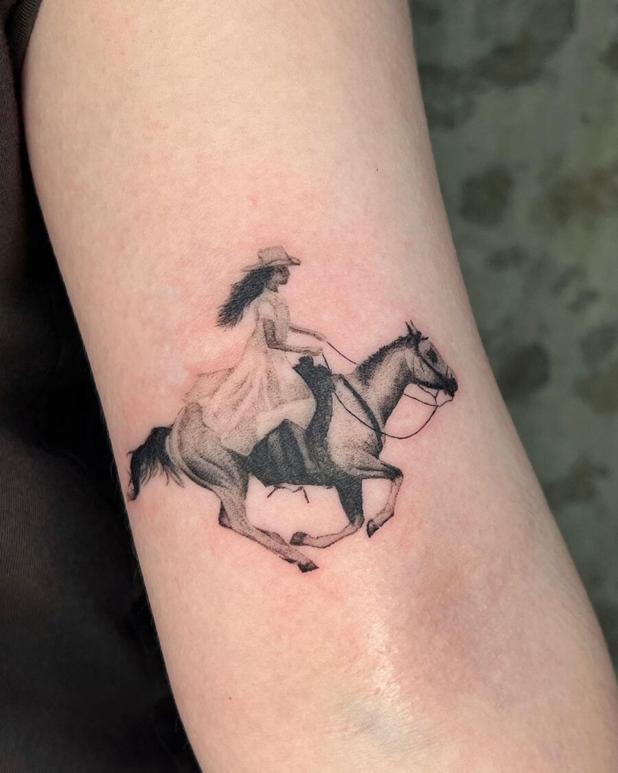 Dynamic Western Woman Riding a Horse Tattoo Tattoo on skin