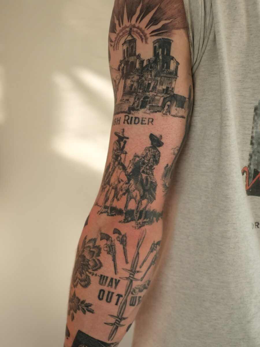 Intricate western-themed tattoos on display Tattoo on skin