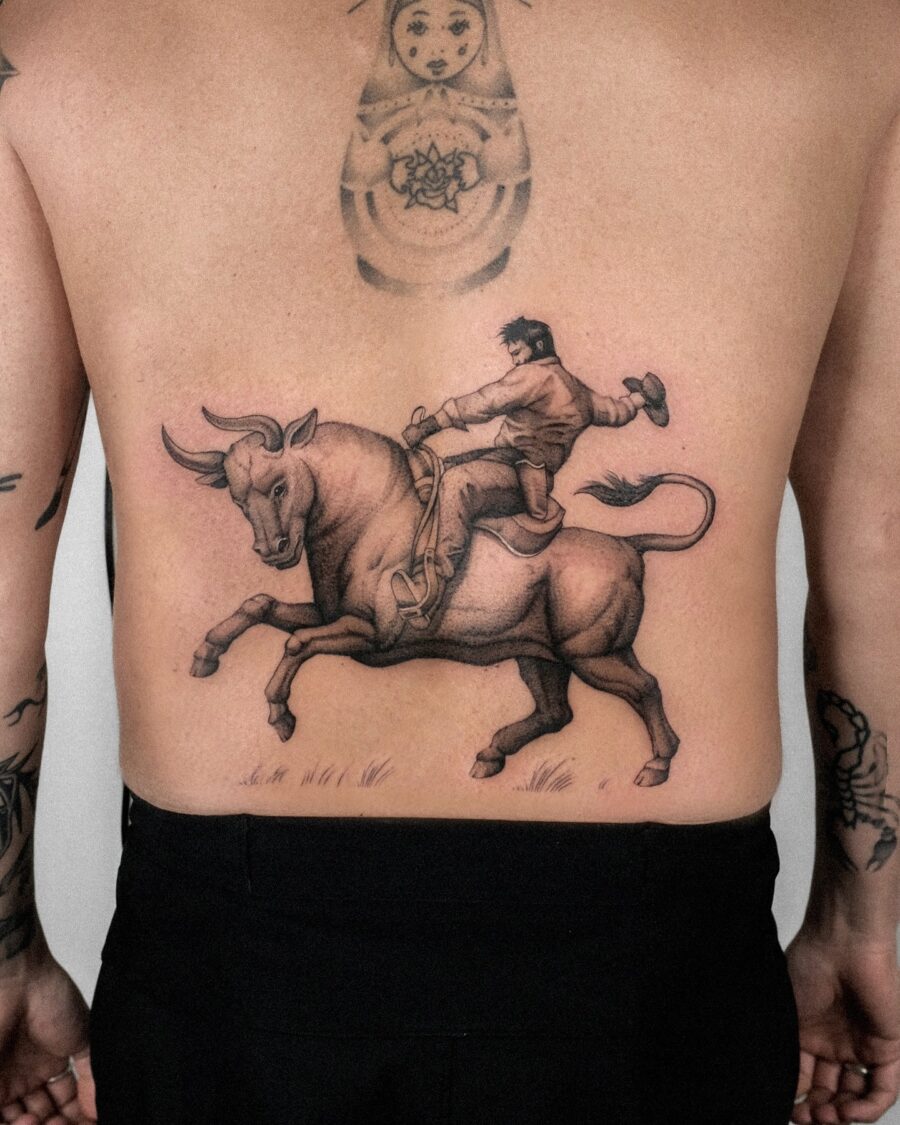 Stunning bull rider tattoo with dynamic motion Tattoo on skin