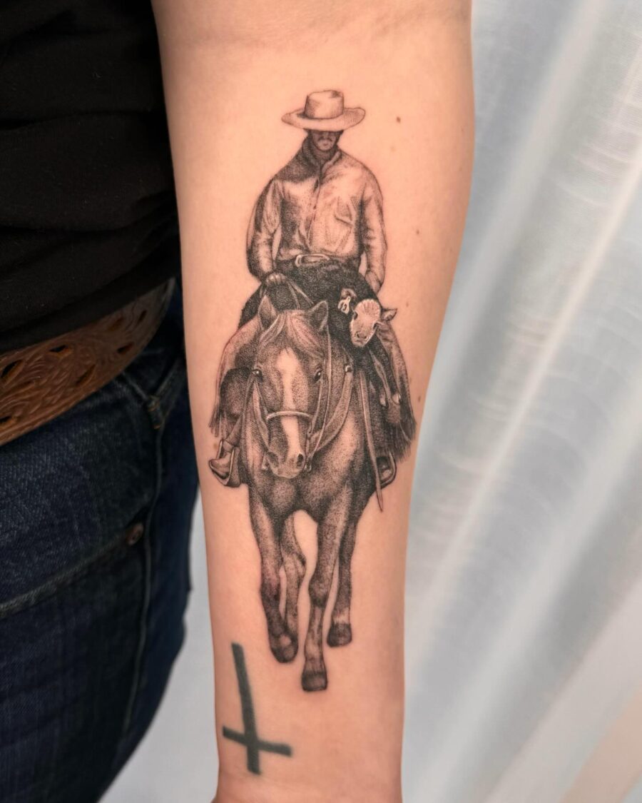 Stunning cowboy tattoo on a forearm Tattoo on skin