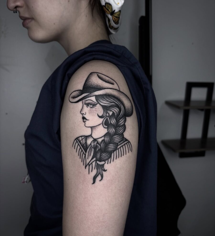 Stylish Cowgirl Tattoo on Upper Arm Tattoo on skin