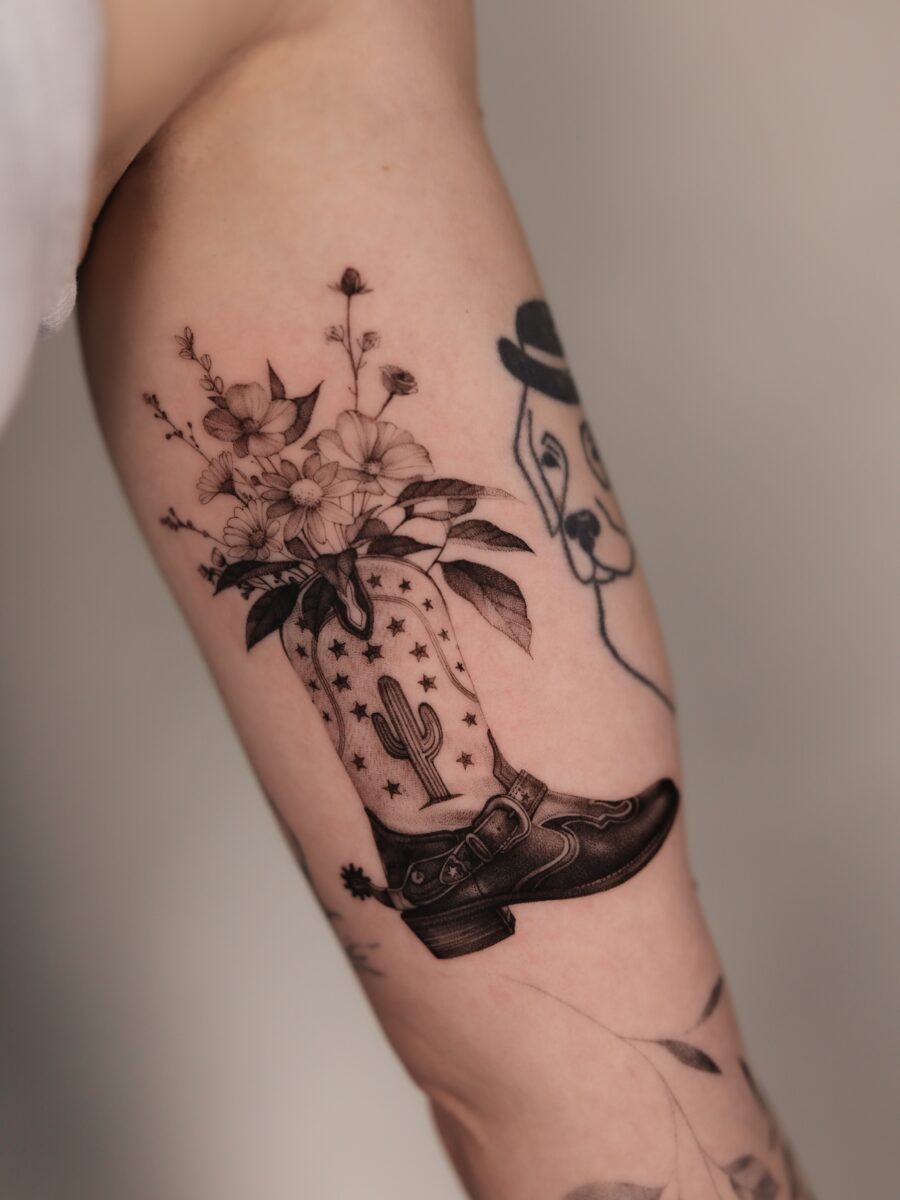 Unique Western-Inspired Floral Boot Tattoo Tattoo on skin