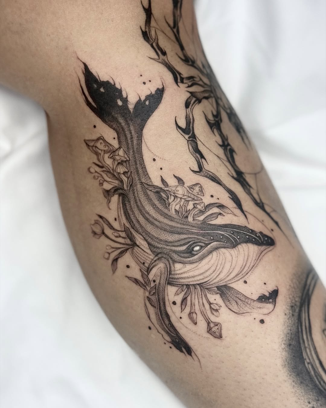 Elegant whale tattoo with intricate details Tattoo on skin