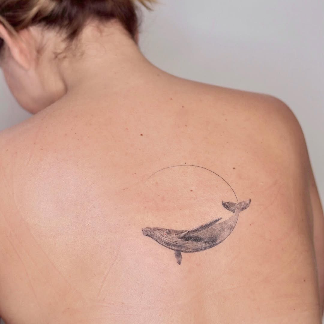 Elegant whale tattoo with minimalist design concept Tattoo on skin
