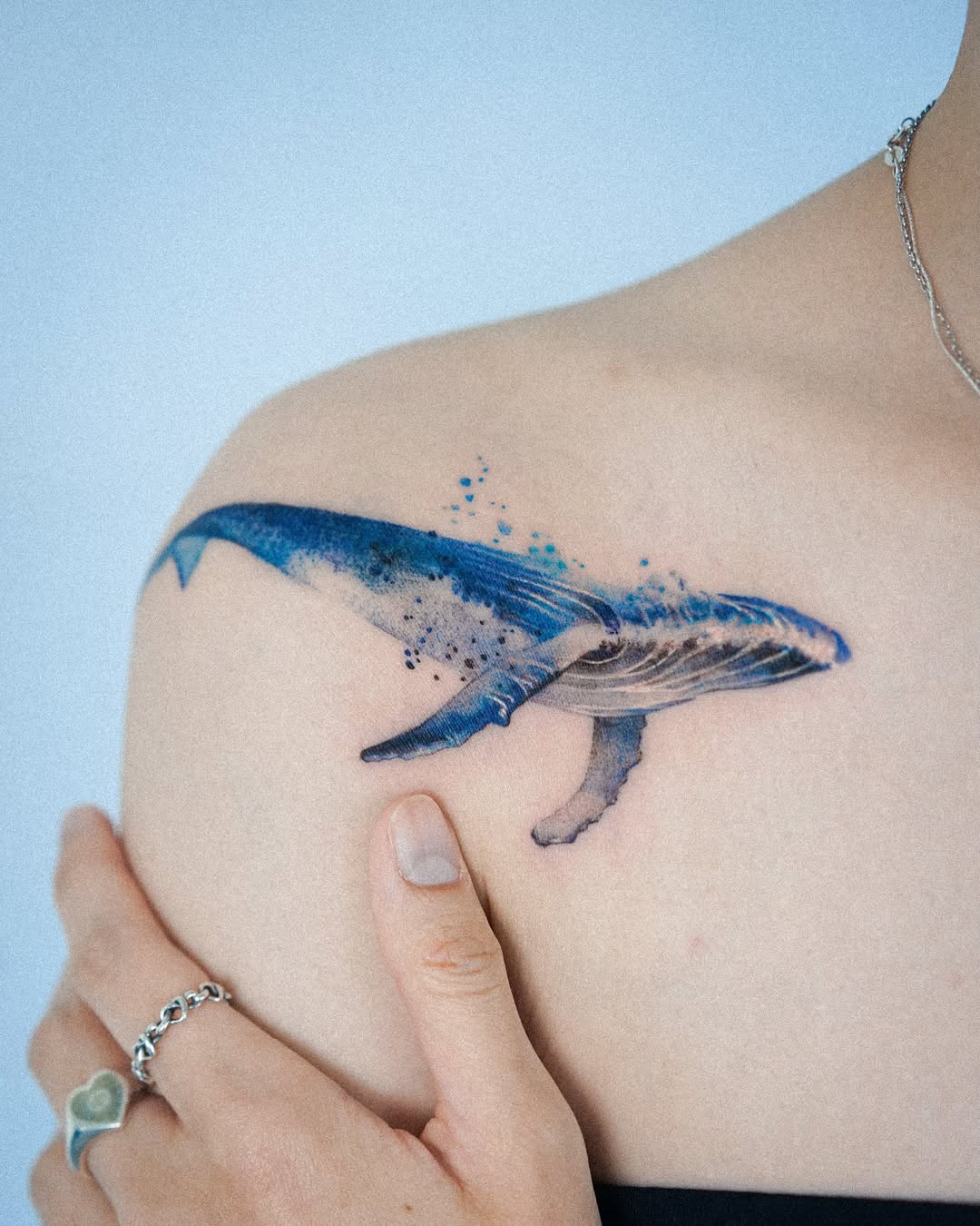 Stunning Colorful Whale Tattoo on Shoulder Tattoo on skin