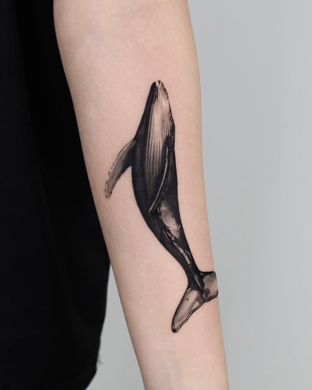 Stunning detailed whale tattoo on forearm Tattoo on skin