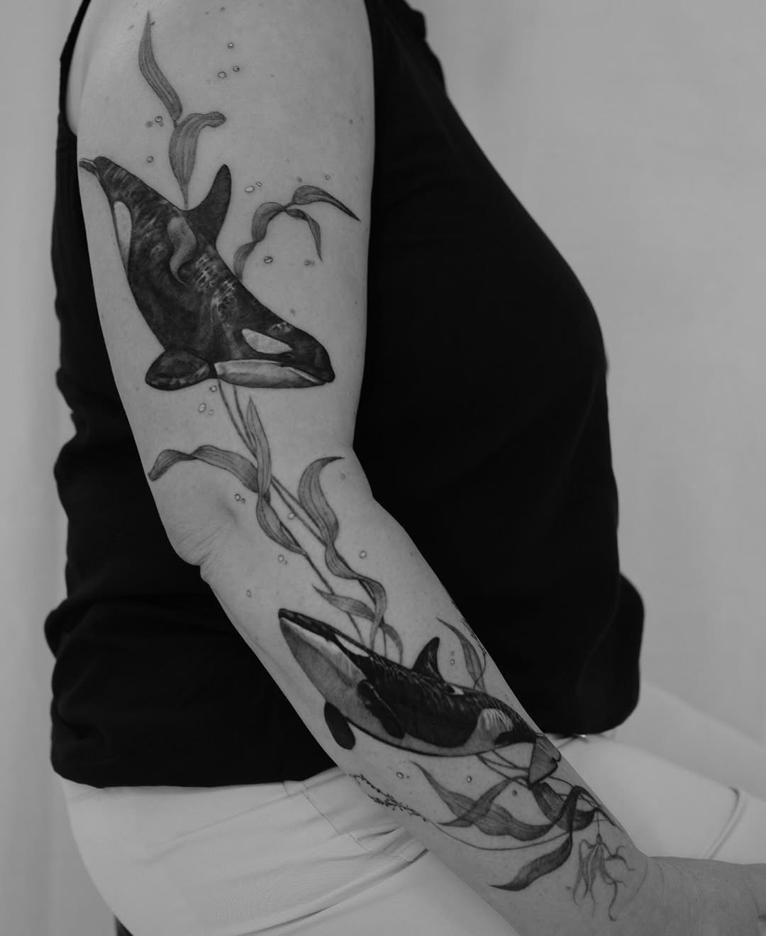 Stunning minimalist whale tattoo on the arm Tattoo on skin