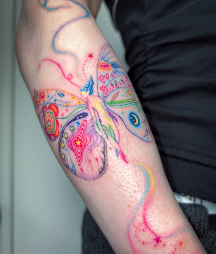 A vibrant butterfly tattoo bursting with creativity Tattoo on skin
