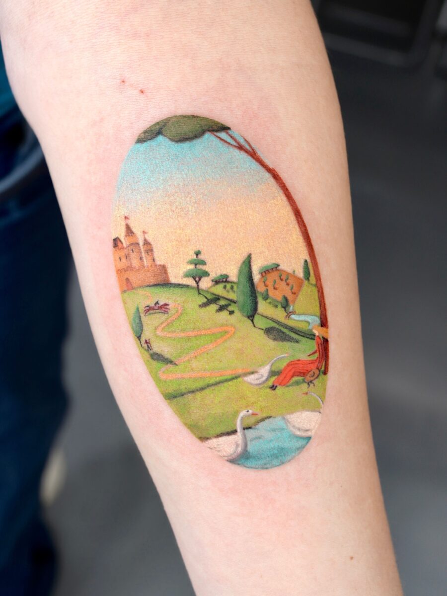 A whimsical landscape tattoo bursting with color Tattoo on skin