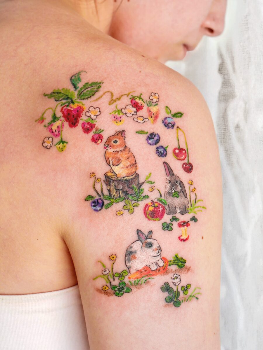 Charming animal and floral tattoo cluster Tattoo on skin