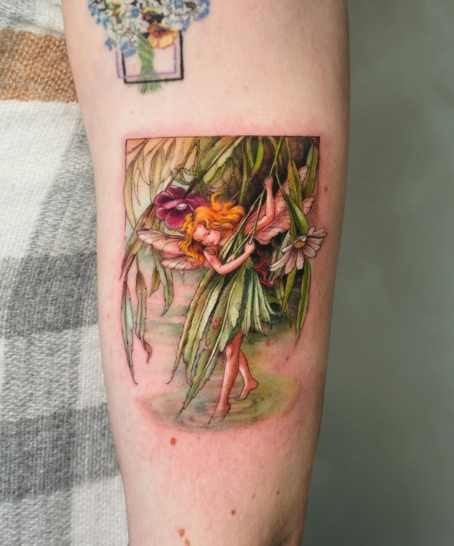 Enchanting fairy surrounded by lush foliage Tattoo on skin