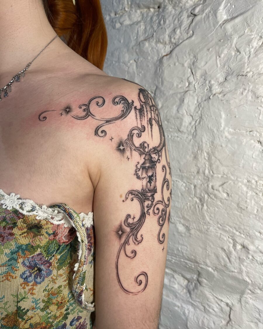 Intricately designed floral whimsy on shoulder Tattoo on skin