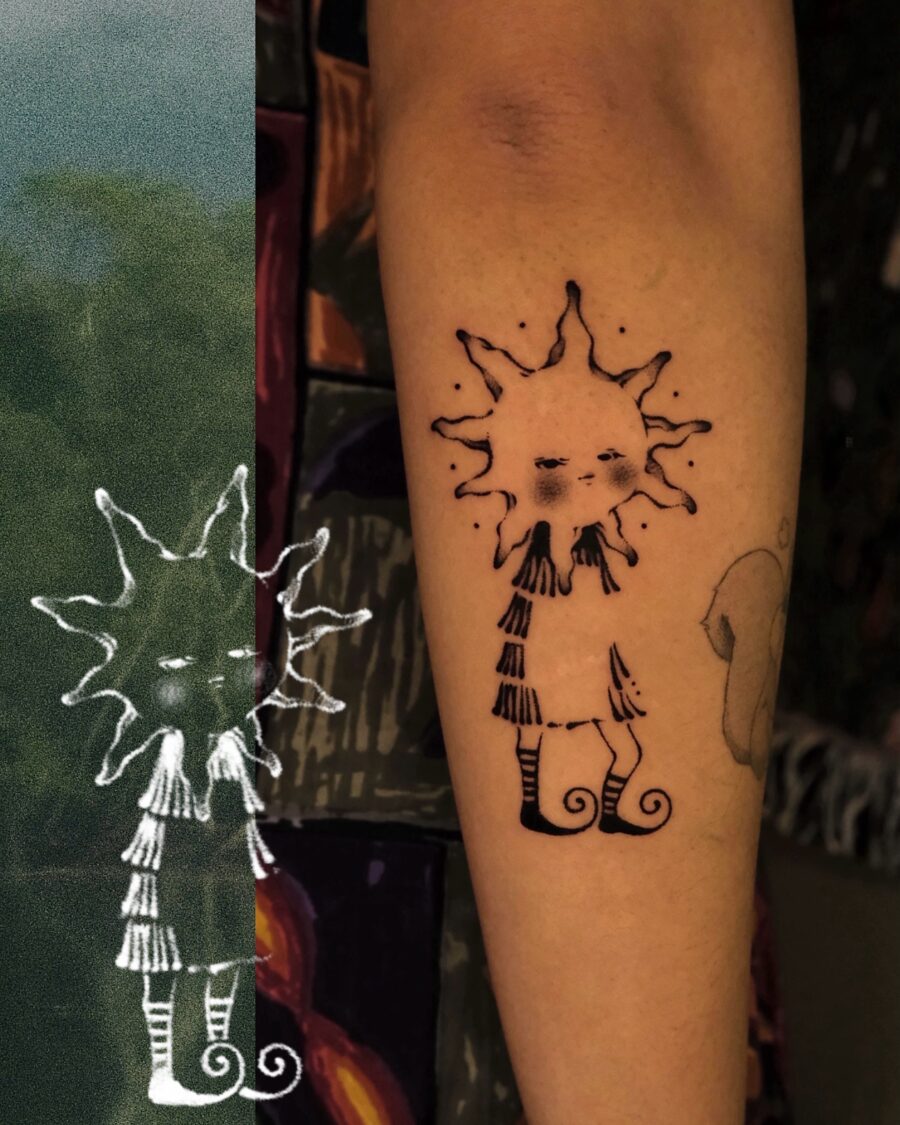 Unique sun character tattoo with playful charm Tattoo on skin