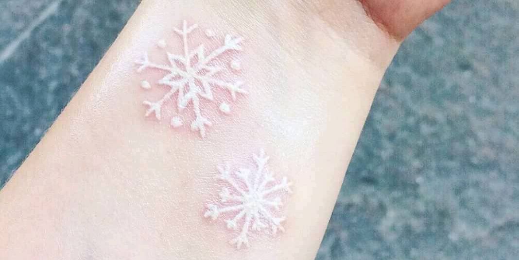 Delicate Like the Fallen Snow White Ink Tattoo Tattoo on skin