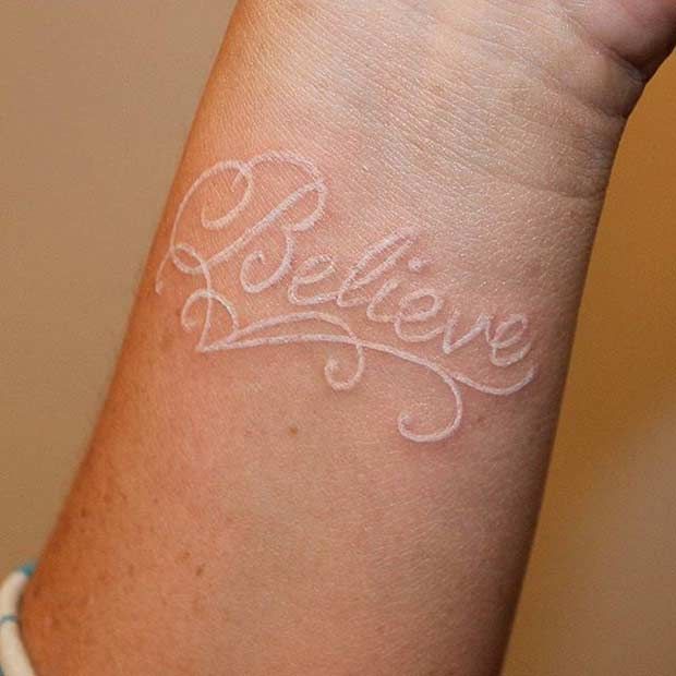 Simple Statement White Ink Tattoo With Text Tattoo on skin