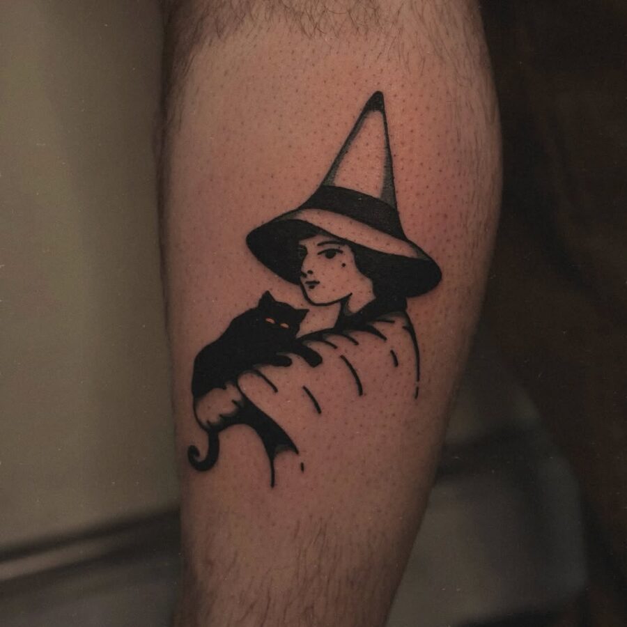 Charming witch hat tattoo with cat companion Tattoo on skin