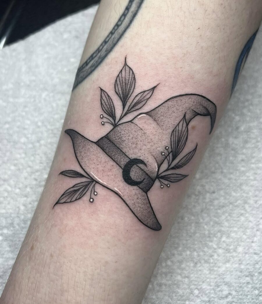 Charming Witch Hat Tattoo with Leaf Accents Tattoo on skin