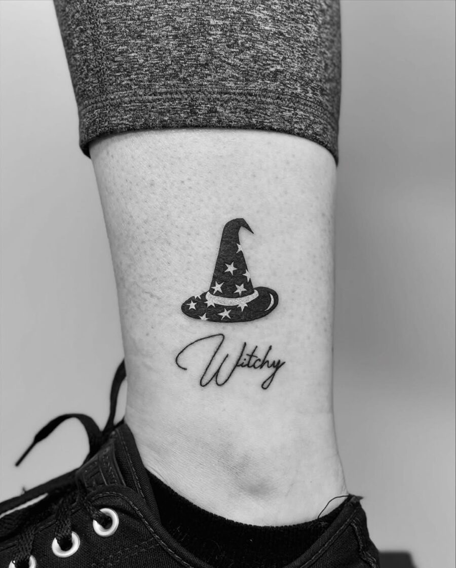 Elegant witch hat tattoo with a whimsical touch Tattoo on skin
