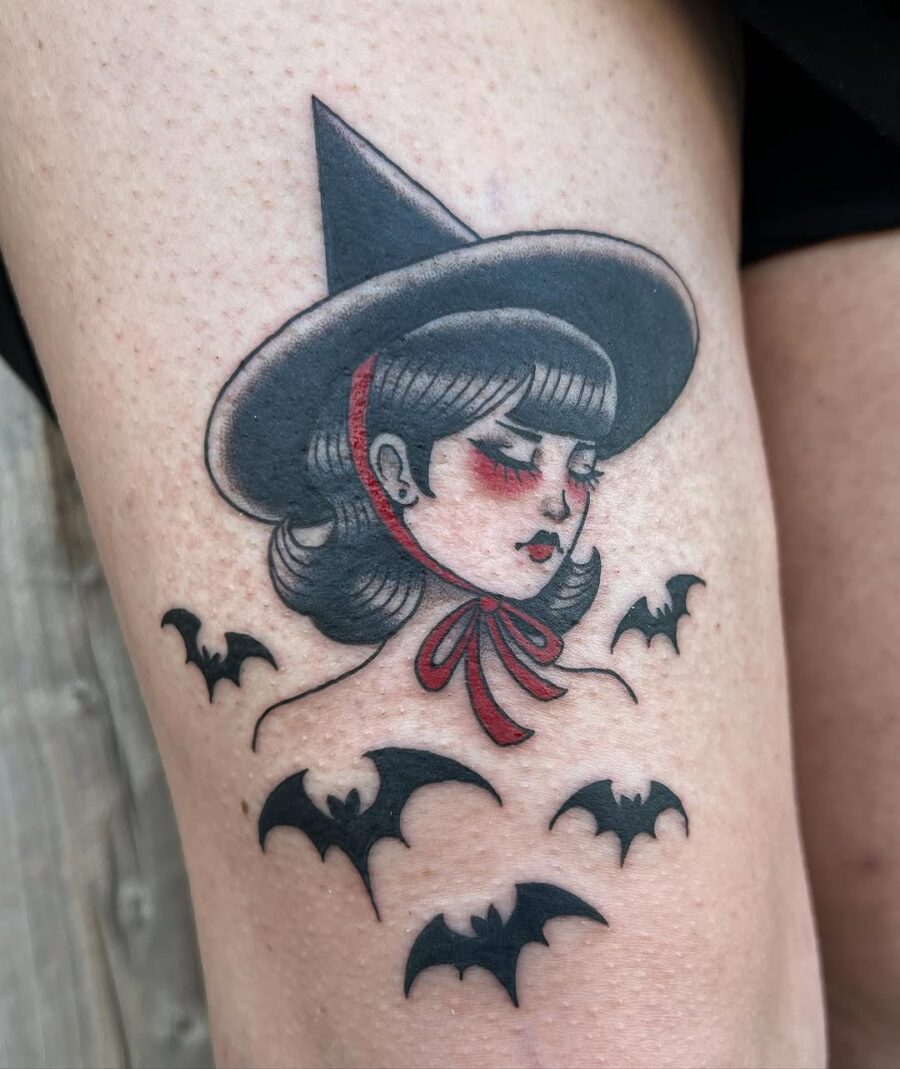 Enchanting witch hat tattoo with bat accents Tattoo on skin