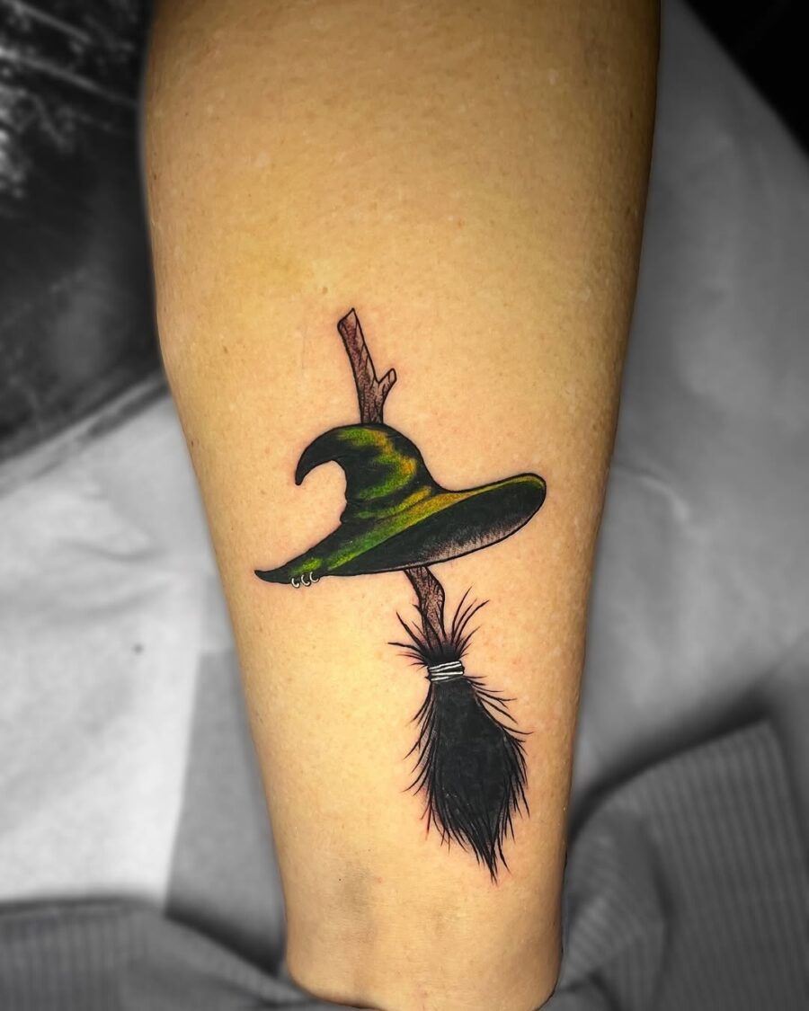 Stylish witch hat tattoo with a whimsical flair Tattoo on skin
