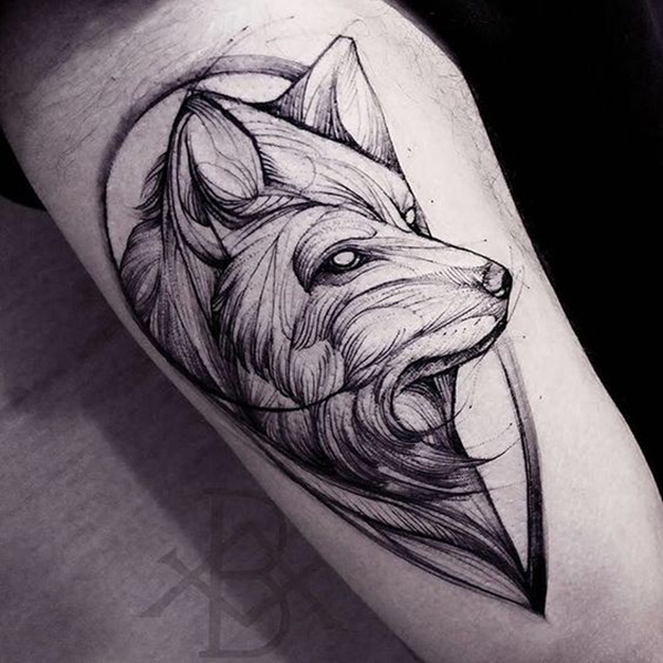 3/4-View Stylized Watchful Wolf Crest Tattoo on skin