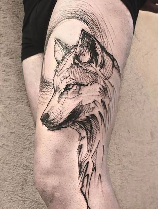Artistic Pen-Drawn Wolf with Moon Tattoo on skin