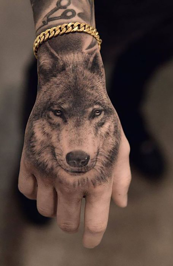 Black & White Realistic Wolf Hand Tattoo wolf tattoos