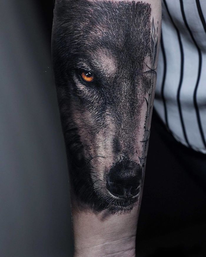 Realistic Wolf Face with Amber Eyes Tattoo on skin
