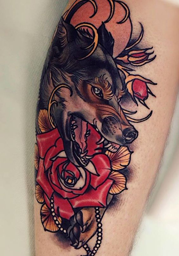 Snarling Wolf with Roses & Pearls Tattoo on skin