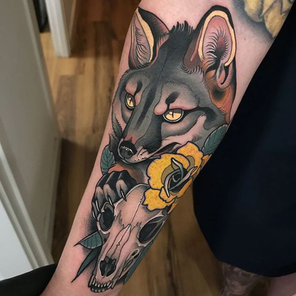 Wolf with Yellow Rose & Skull Tattoo on skin