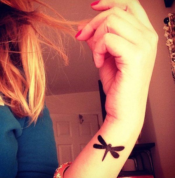 Paper wasp wrist tattoo Tattoo on skin